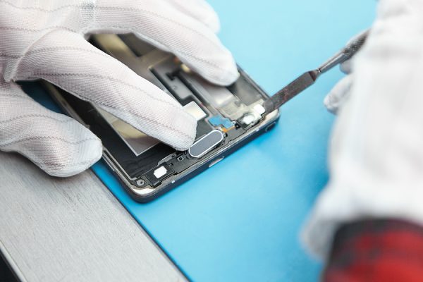 Close Up Shot Of Unknown Male Wearing White Antistatic Gloves Re